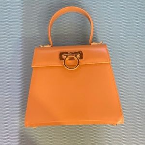 Beige color real leather top handle handbag